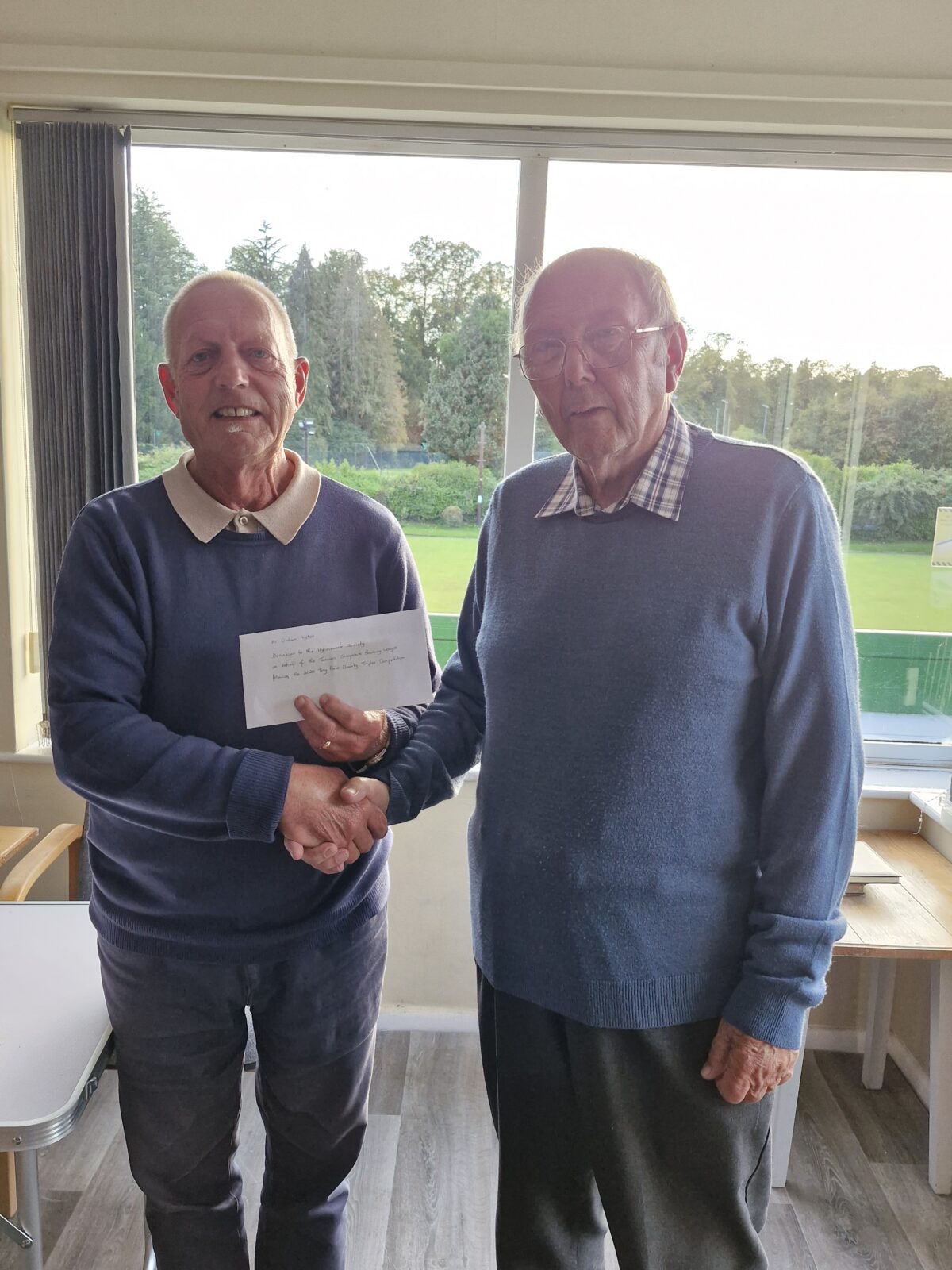 Charity Triples presentation to Alzheimer’s Society